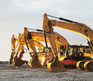 Row of yellow heavy machinery equipment