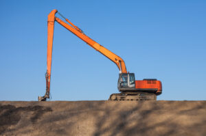 orange long reach excavator